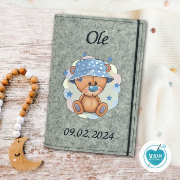 Designbeispiel der U-Heft Hülle grau meliert Teddy mit Sternen für Jungs